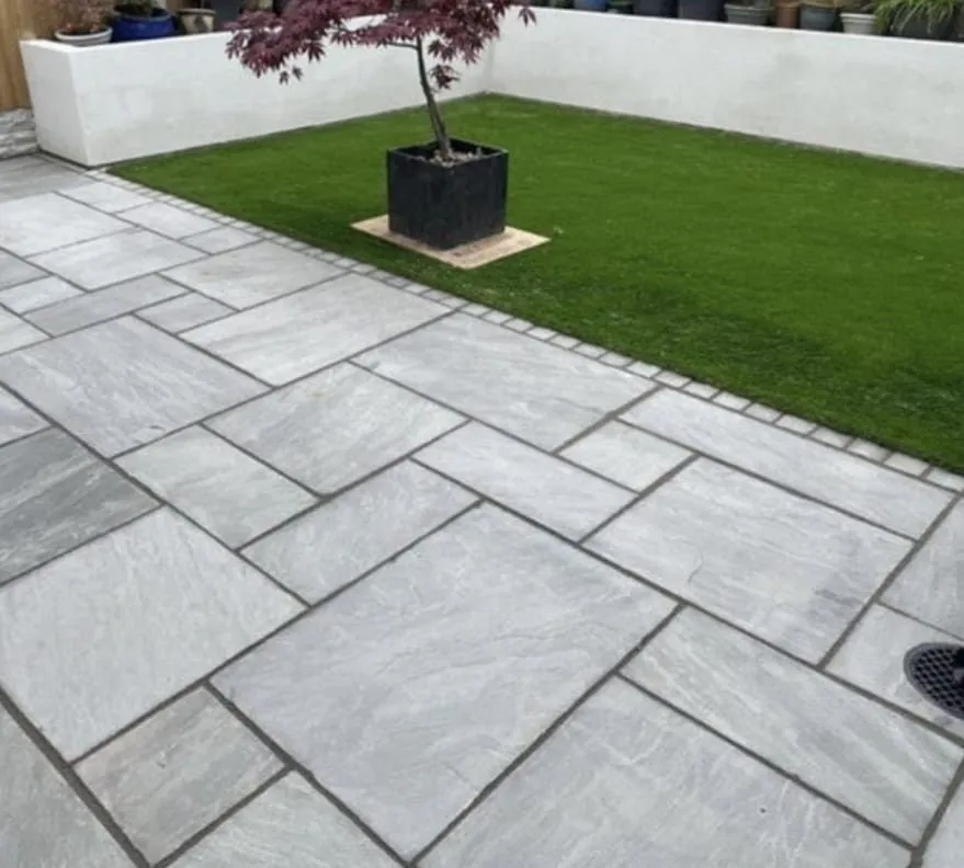 A sandstone, porcelain or block paving patio built by Amber and Sisters