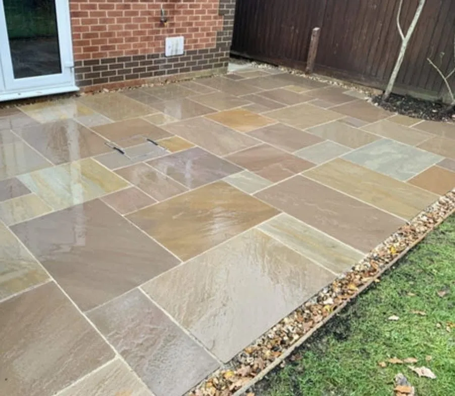 A sandstone, porcelain or block paving patio built by Amber and Sisters