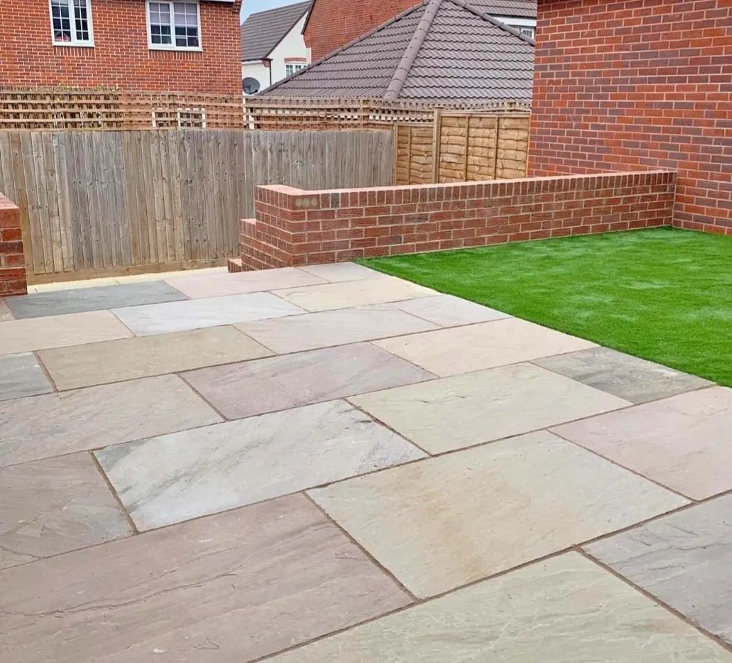A sandstone, porcelain or block paving patio built by Amber and Sisters