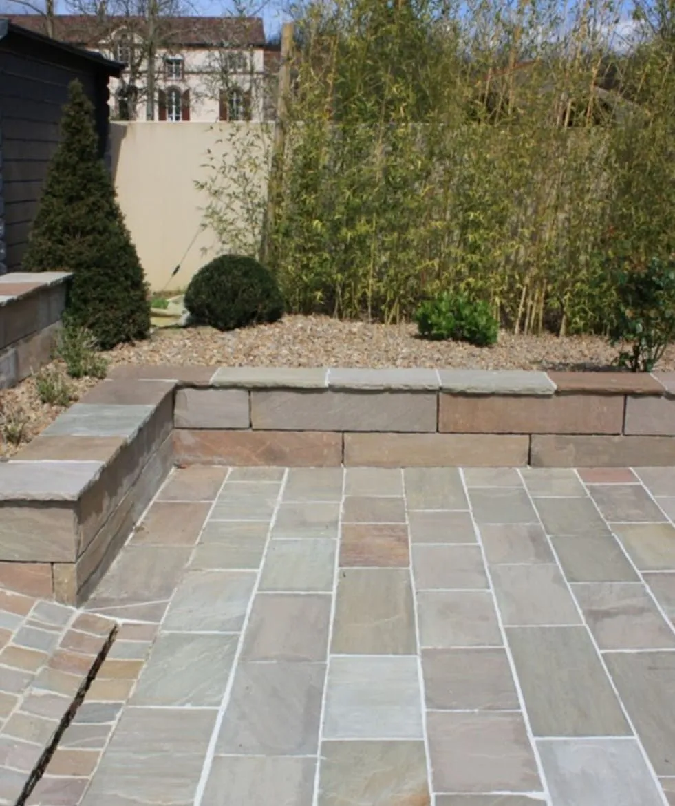 A sandstone, porcelain or block paving patio built by Amber and Sisters